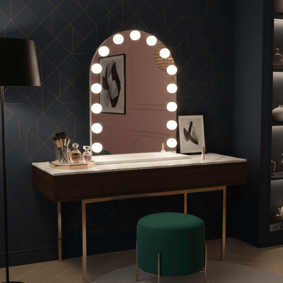 Charlize Arch Hollywood Mirror 80 x 60cm with LED bulbs on a stylish vanity setup.