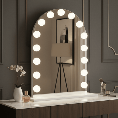Charlize Arch Hollywood Mirror 80 x 60cm with LED bulbs on vanity in elegant setting.