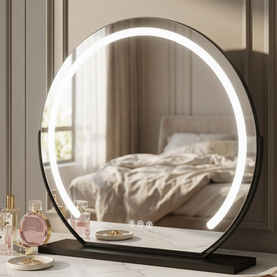 Round LED vanity mirror on a table with a bedroom in the background