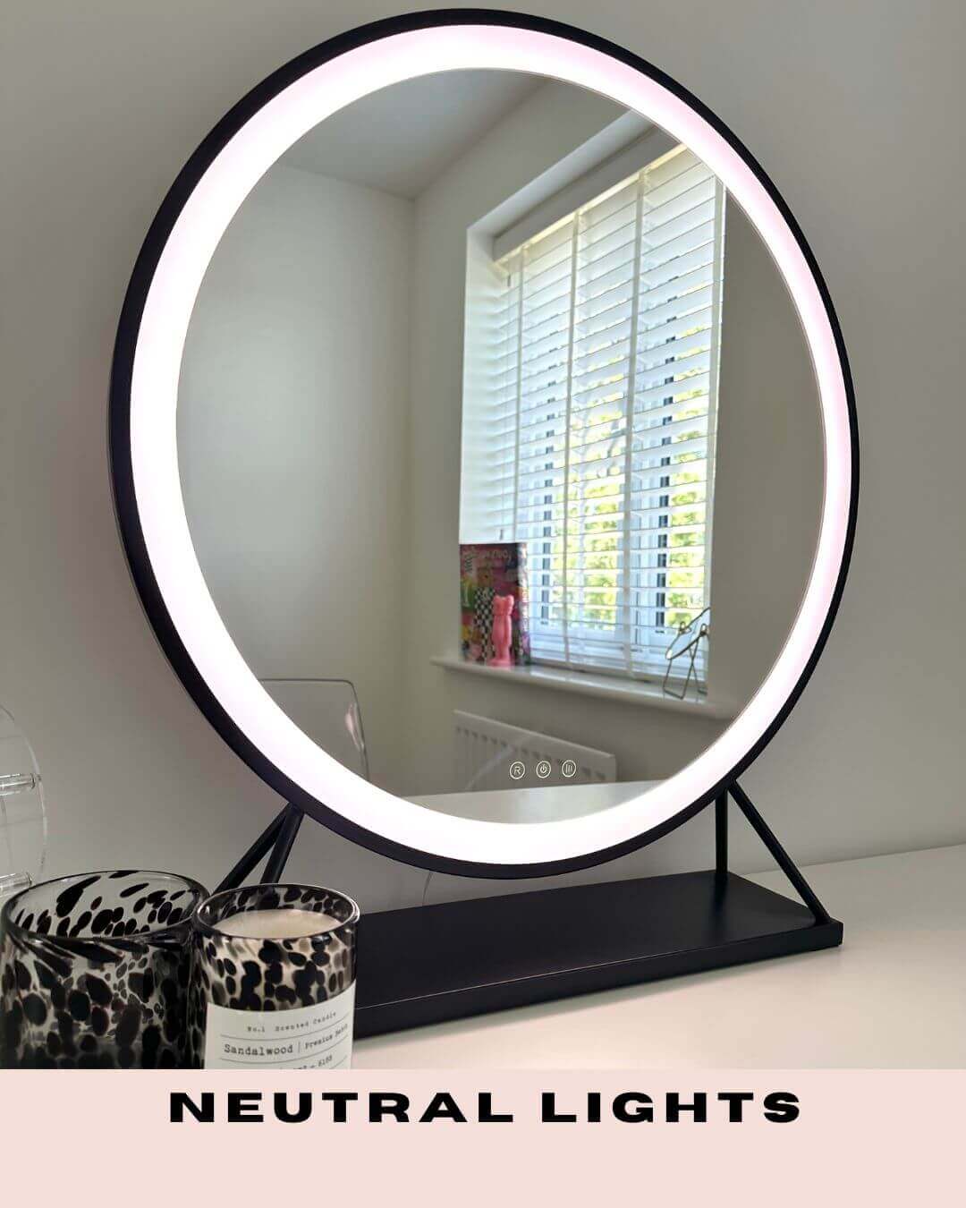 Luxurious black frame Hollywood mirror with neutral lighting, 60x63cm, elegant dressing room essential, customizable LED settings.