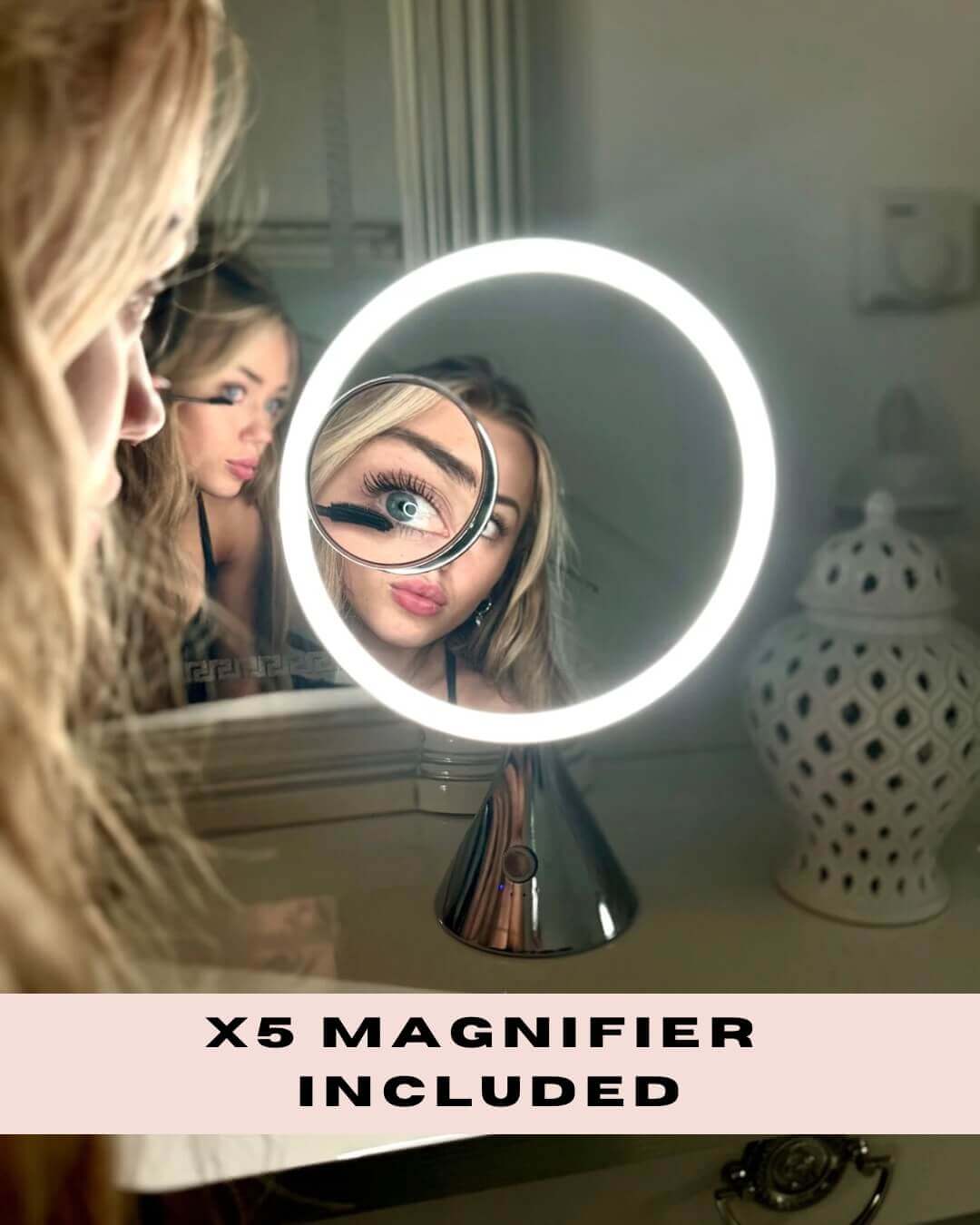Woman using LumiGlam Pro Cosmetic Vanity Mirror with LED lights and x5 magnifier in chrome for detailed makeup application.