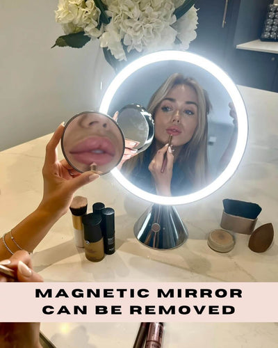 Woman using LumiGlam Pro Vanity Mirror with removable magnetic mirror, applying makeup with LED lighting.