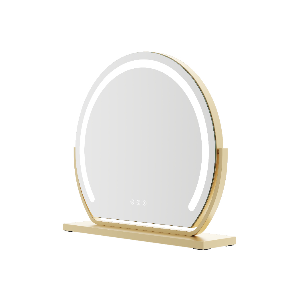 Round makeup mirror with gold frame and wooden base on a white background