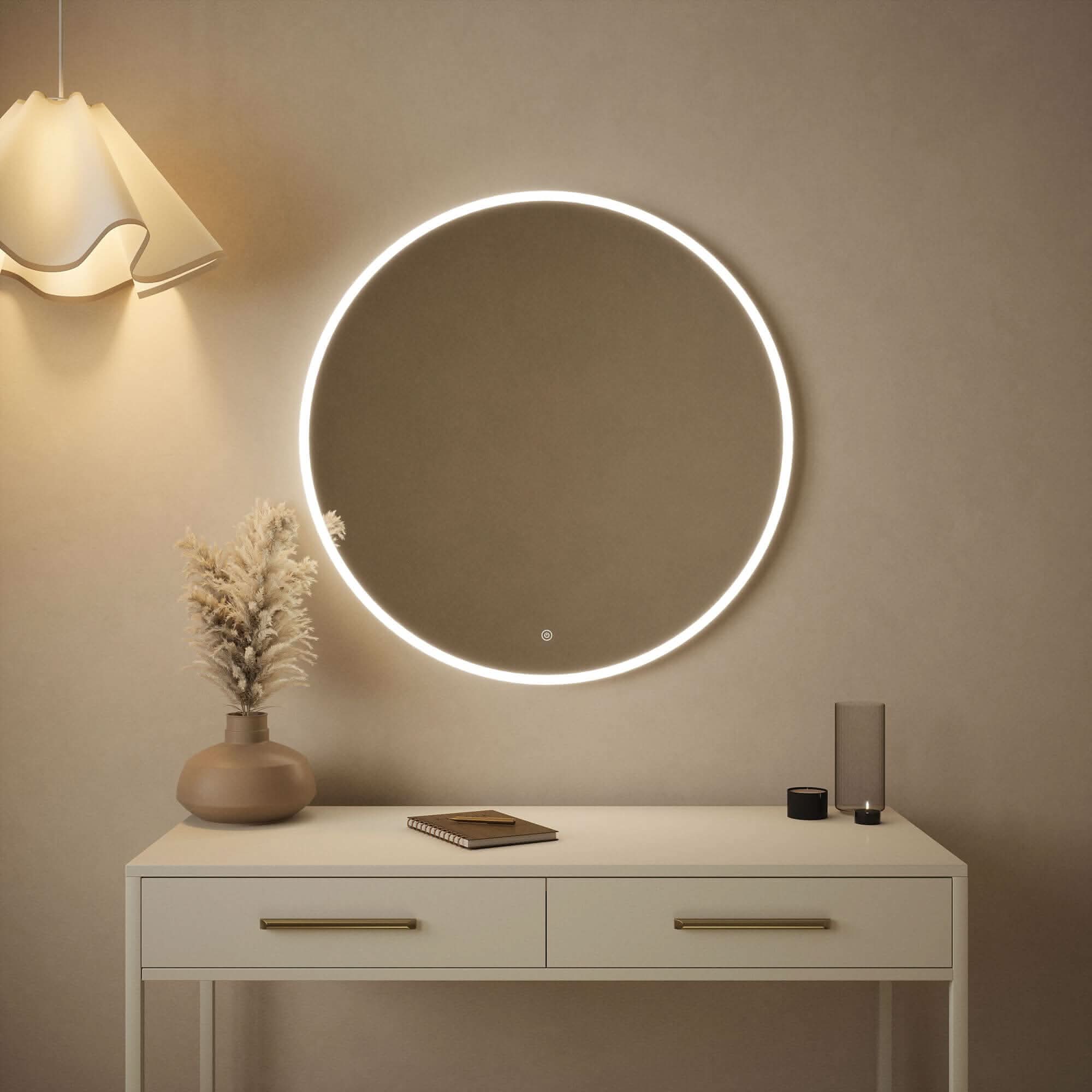 Luna 80cm round wall-mounted backlit mirror with soft glow in bedroom setting, featuring sleek touch control panel.