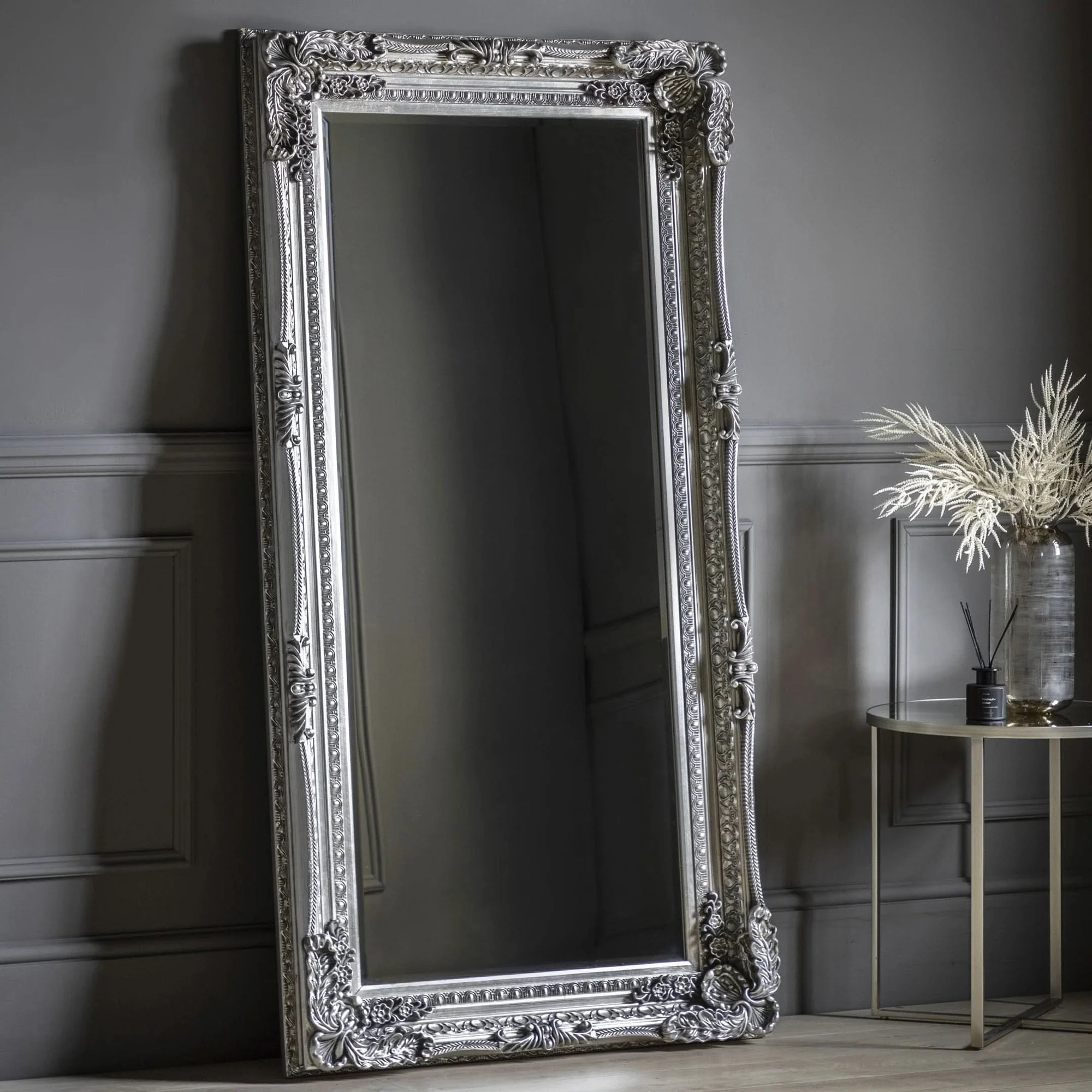 Charles Leaner Mirror in silver with ornate frame, 176cm x 90cm, adding elegance and light to a modern grey room.