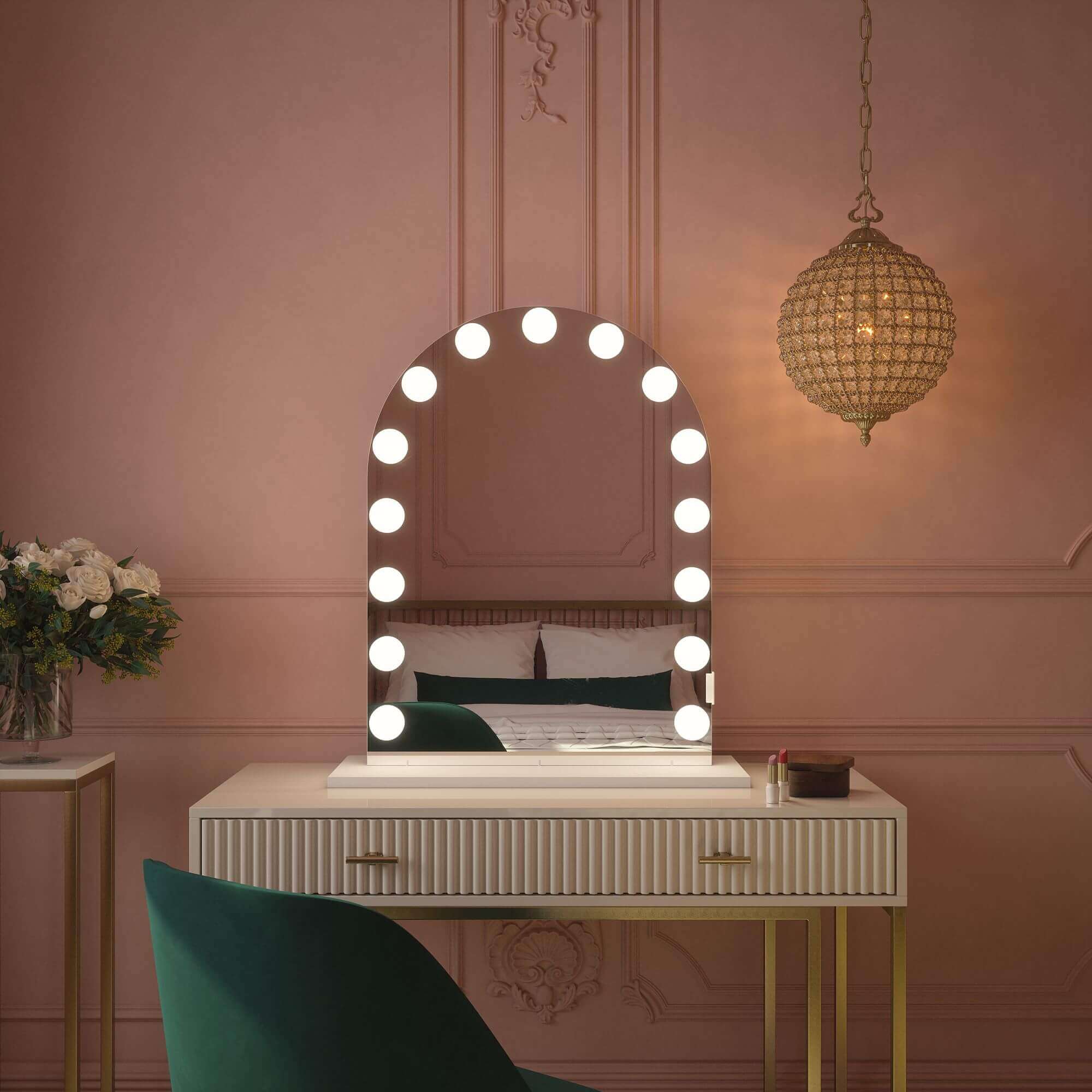 Charlize Arch Hollywood Mirror with LED bulbs on a white vanity, elegant design with built-in power, perfect for makeup routines.