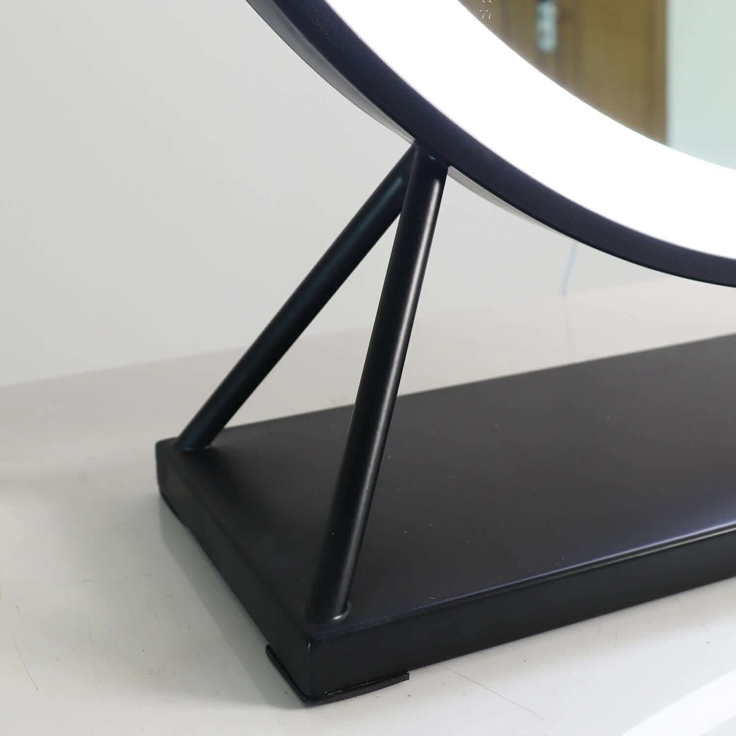 Luxurious Grace Round Hollywood Mirror with black frame and customisable LED lighting, perfect for elegant dressing rooms.