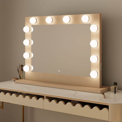 Jolie Gold Hollywood Mirror 80 x 60cm with glowing lights on a vanity table enhances beauty routines and decor