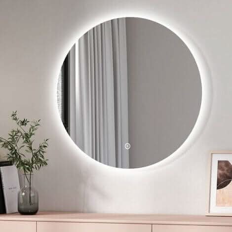 Ava Round Wall Mounted Mirror 80cm with ambient backlighting enhancing modern interior decor.