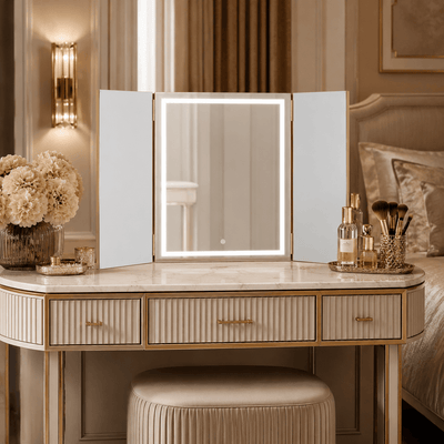Lux Gold trifold mirror on a glamorous cream and gold dressing table