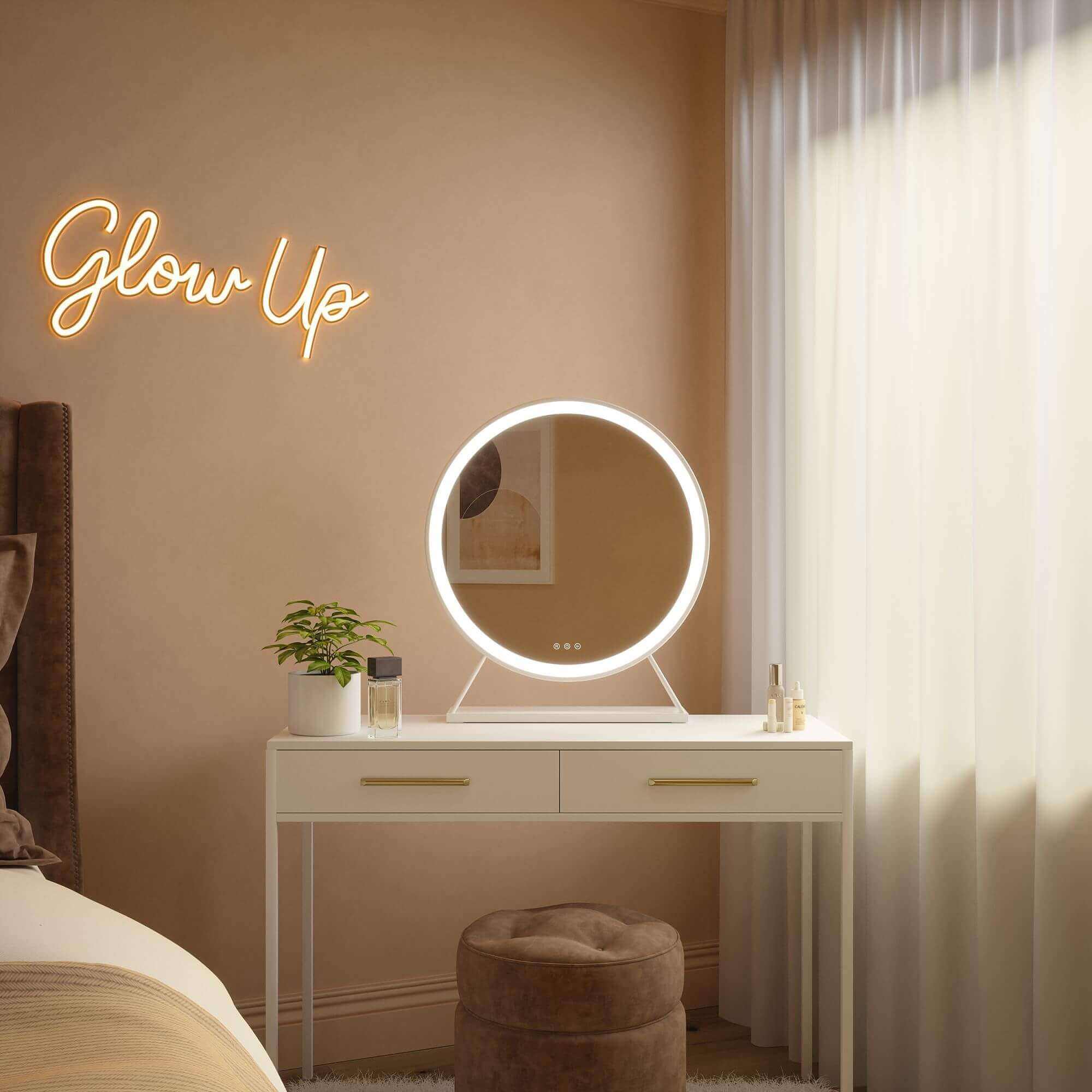 Marilyn Round Hollywood Mirror White 60x63cm illuminated on a stylish vanity table with a 'Glow Up' sign.
