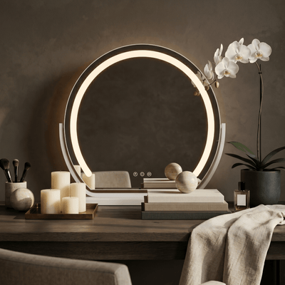 Mila LED Vanity Mirror White placed on a stylish dressing table with decor.