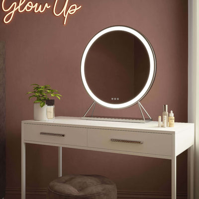 Luxurious silver frame Hollywood mirror with customizable LED lighting on a white vanity table.
