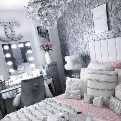 Alicia Hollywood Mirror 60cmx80cm in stylish bedroom with chandelier and decorative pillows.