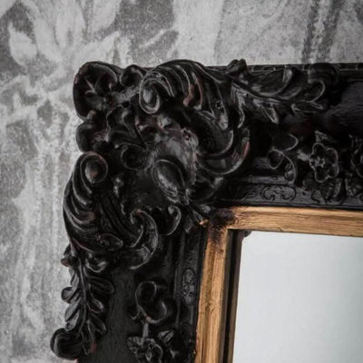 Close-up of Antique Black Baroque Moulding on Large Harrelson Mirror reflecting luxurious design for living spaces.