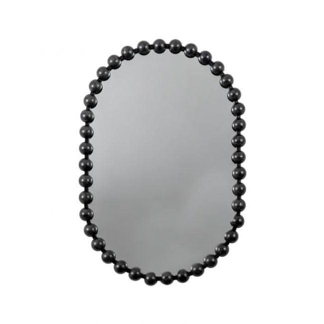 Black Pill Mirror with oversized beading design and bold black frame, modern and stylish addition for home decor.