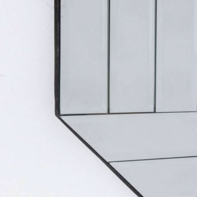 Close-up of Burgate Rectangular Mirror with beveled triple strip frame, enhancing living space decor.