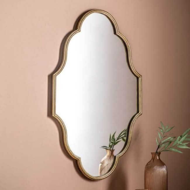 Cassie Gold Wall Mirror with ornate frame, decorative piece for above console or dressing table, adds glamour with detailed design.