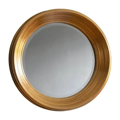Chaplin Round Gold Mirror with elegant gold leaf finish adds luxury and style, perfect for bedroom or living area decor.