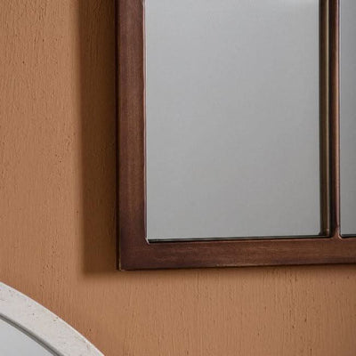 Kelly Bronze Arched Wall Mirror with antique bronze finish, slim window style detail; perfect for light and decoration.