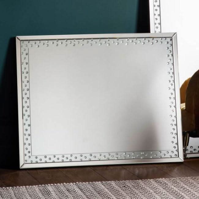 Large Eastmoore Silver Mirror with bevelled inlaid frame enhancing home décor.