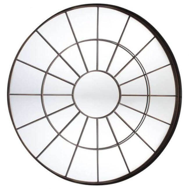 Large round chic window mirror with bronzed metal frame and textured glass, adding rustic charm to home decor. Industrial style.