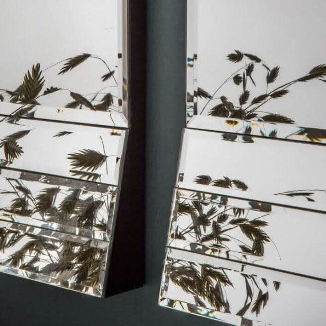 Close-up of Quart Mirror set showing beveled glass frames with stylish reflective pattern, ideal for home decor enhancement.