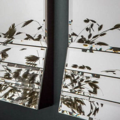 Close-up of Quart Mirror set showing beveled glass frames with stylish reflective pattern, ideal for home decor enhancement.