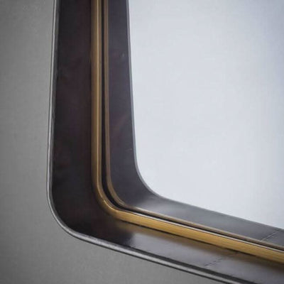 Close-up of the Rectangle Earl Mirror with tapered frame and two tone finish, showcasing its unique style and flair for home decor.