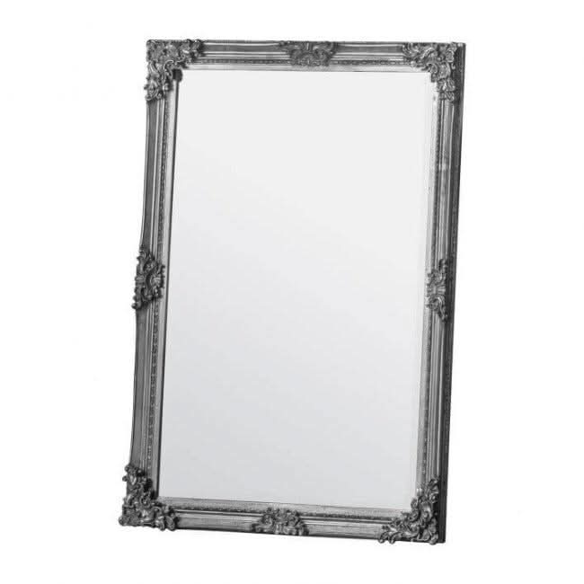 Silvery Small Fiennes Mirror with intricate frame design, perfect for elegant home decor. Dimensions: 720mm x 50mm x 1,030mm.