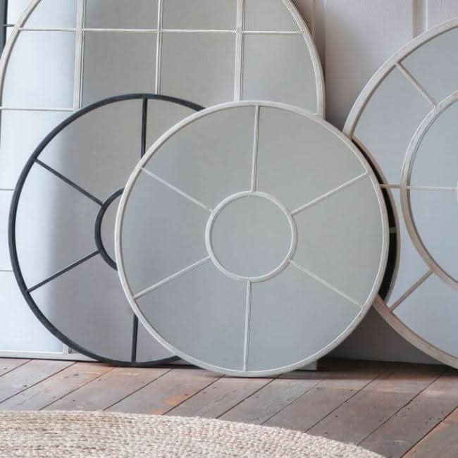 White round Valence mirror with window-style design, perfect for cottage or contemporary decor, shown on wooden floor.