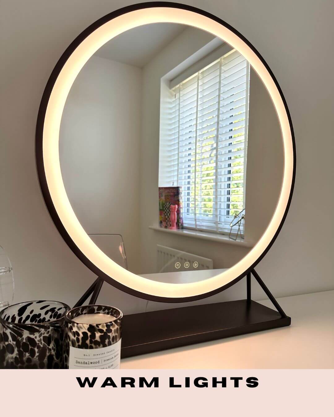 Grace Round Hollywood Mirror with Black Frame, featuring warm LED lights, ideal for elegant dressing rooms, size 60x63cm.