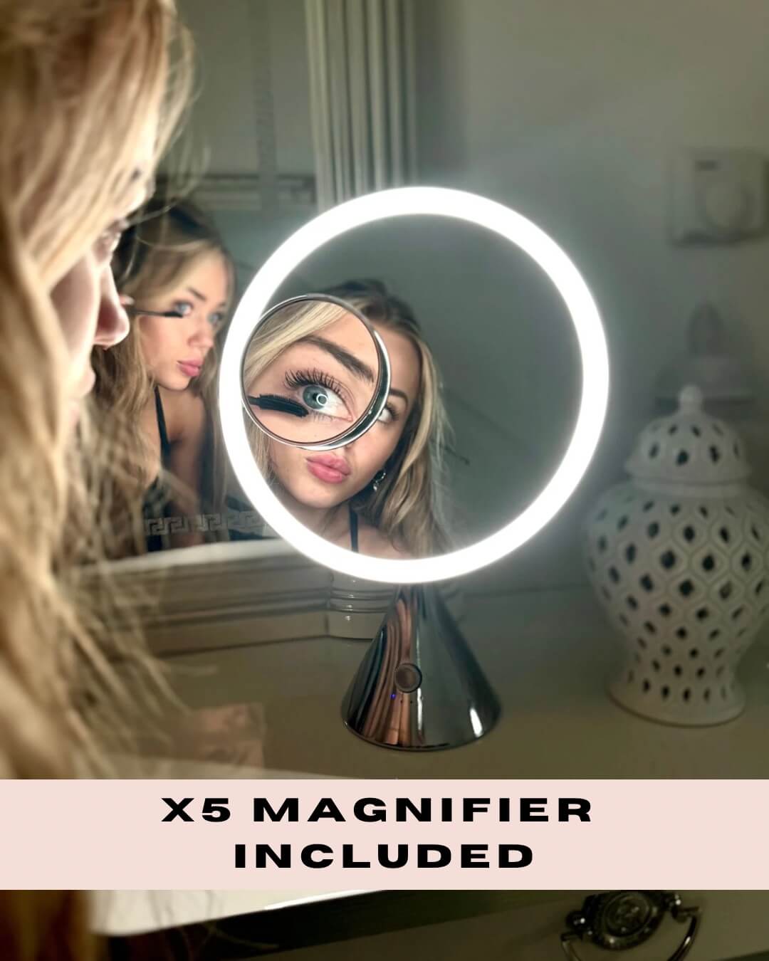 Woman using LumiGlam Pro Cosmetic Vanity Mirror with LED lights and x5 magnifier in chrome for detailed makeup application.