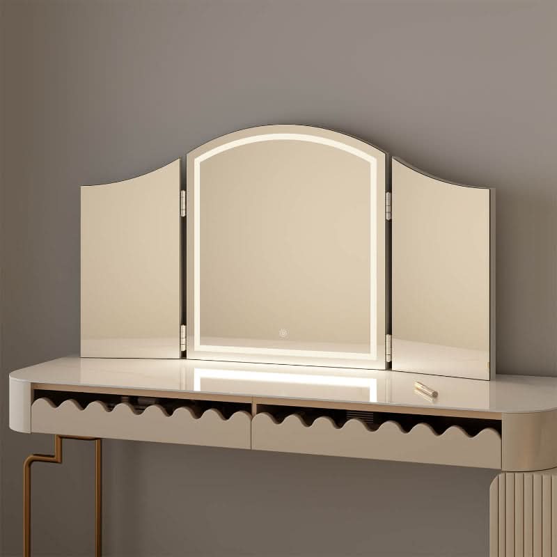 Cate Triple Dressing Table Mirror with LED lighting and trifold shape on elegant vanity, offering flawless visibility and timeless design.