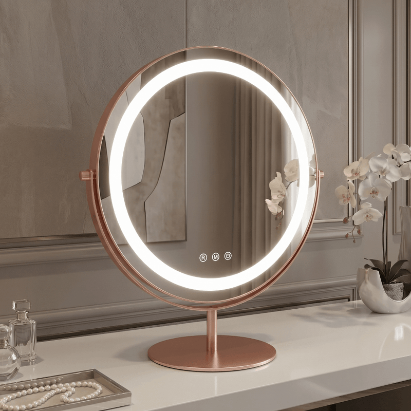 Celeste LED Vanity Mirror — Rose Gold on a marble vanity with flowers and makeup tools.
