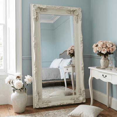 Charles full length cream ornate leaner mirror 176cm x 90cm styled in duck egg blue French bedroom with white peonies and Persian rug — Hollywood Mirrors