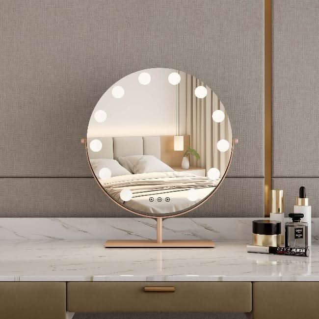 Hawn Gold Round Hollywood Mirror 42x48cm on vanity with LED lighting, ideal for stylish dressing room or makeup station.