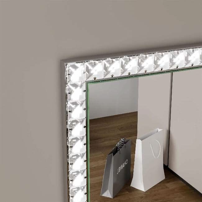 Crystal Edge Full Length Mirror showcasing detailed border design with shopping bags reflecting; elegant decor piece for any room.