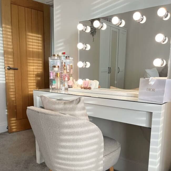 Vanity table with Hepburn Hollywood Mirror, showcasing LED bulbs and high-gloss design, perfect for flawless makeup and glam shots.