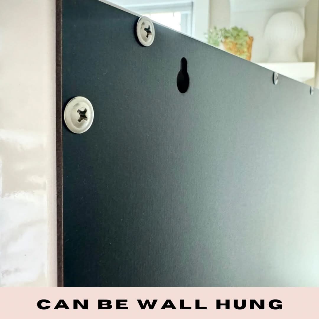 Close-up of the back of the Jessica Hollywood Mirror 58cmX46cm, showing screws and a keyhole slot for wall mounting. CAN BE WALL HUNG text highlights its versatility with LED bulb lighting options.