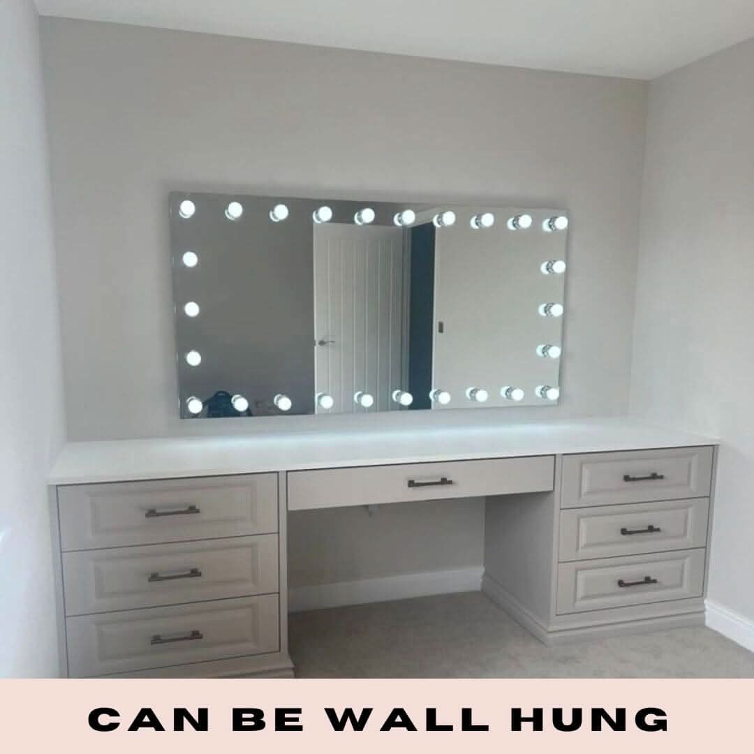 Hollywood mirror with LED bulbs, wall mounted above a white vanity table, provides perfect lighting for makeup, text: 'Can Be Wall Hung'
