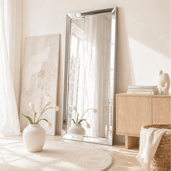 Limelight full length silver leaner mirror 178cm x 78cm styled in bright Scandi minimalist living room with white tulips and pale oak floor