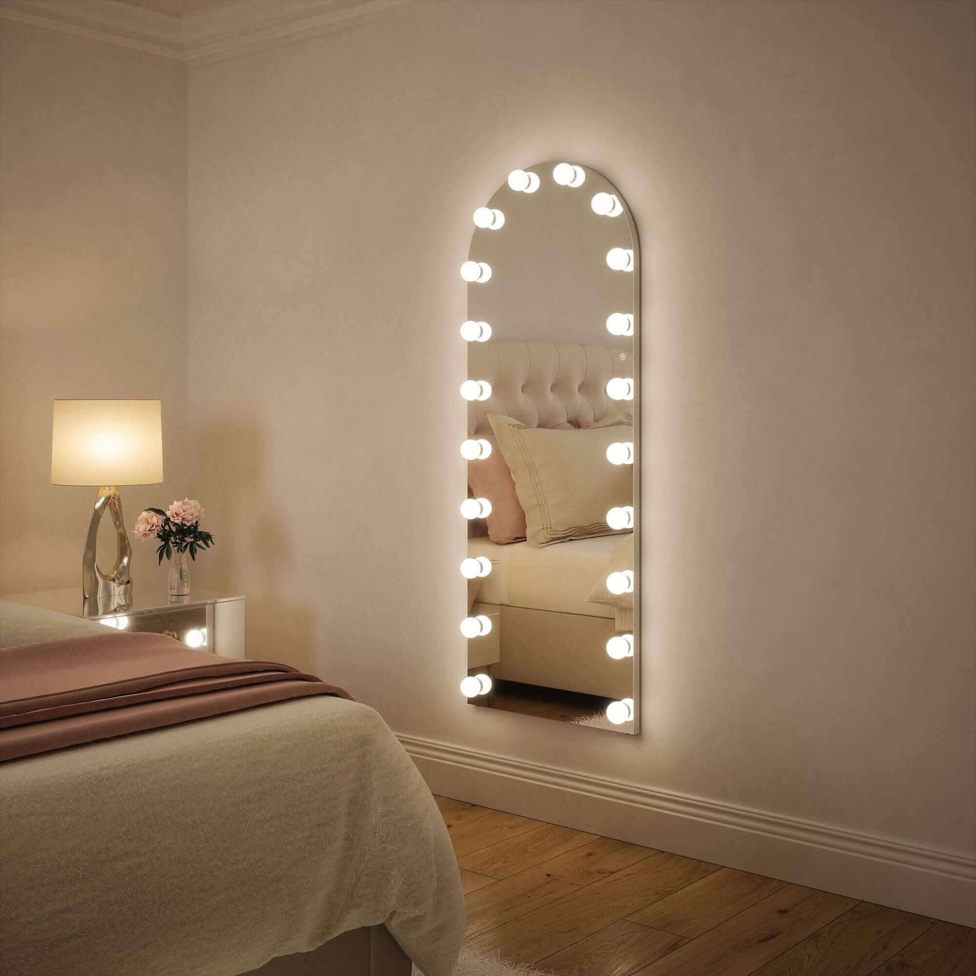 Angelina full-length arch Hollywood mirror with LED bulbs in bedroom setting, 160 x 60cm, showcasing versatile lighting modes.