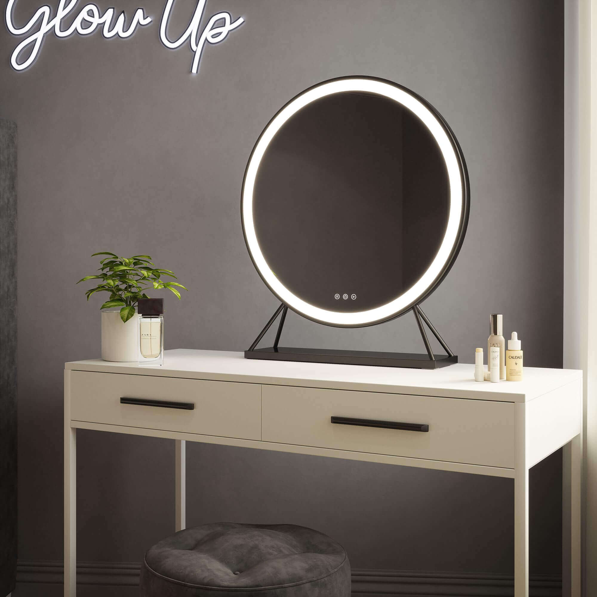 Luxurious black frame Hollywood mirror on white vanity, featuring customizable LED lighting. Ideal for elegant dressing rooms.