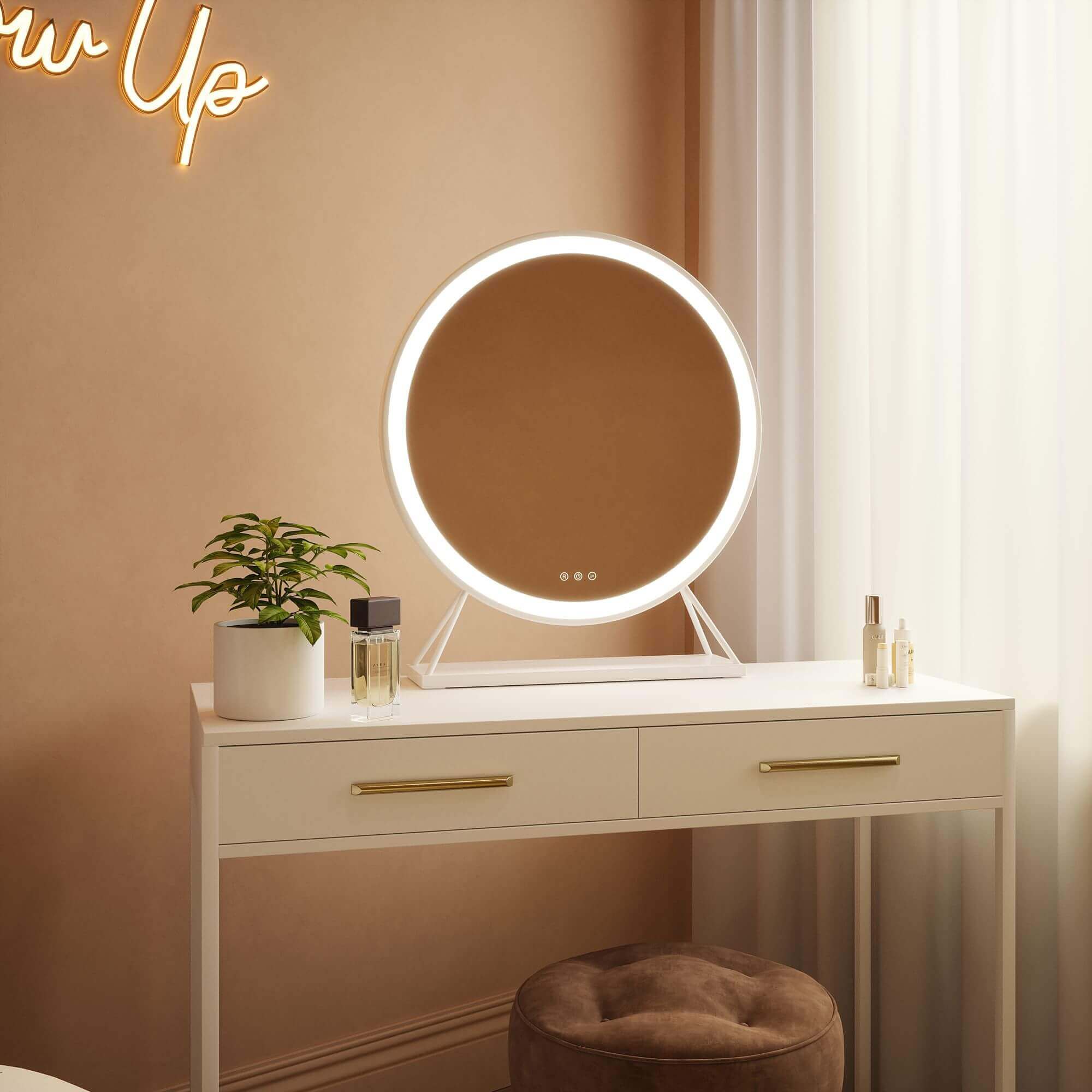Luxurious white frame Hollywood mirror with LED lighting on modern vanity. Elegant round design adds style to any dressing room.