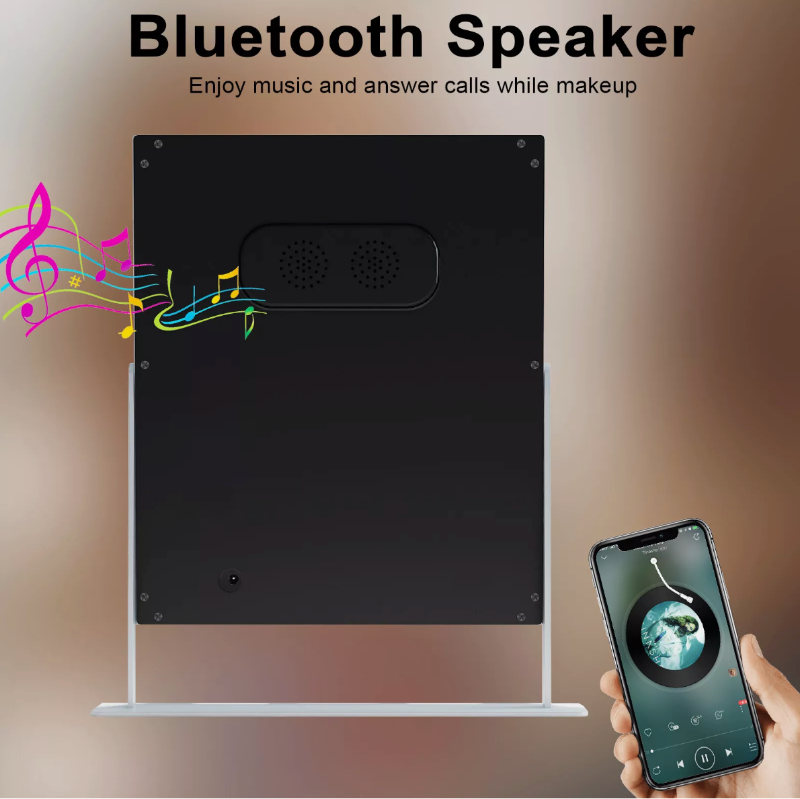 A hand holds a smartphone with a music app near the Renée Bluetooth Hollywood Mirror 30x25cm, which features LED bulbs and lets you enjoy music or answer calls while doing your makeup.