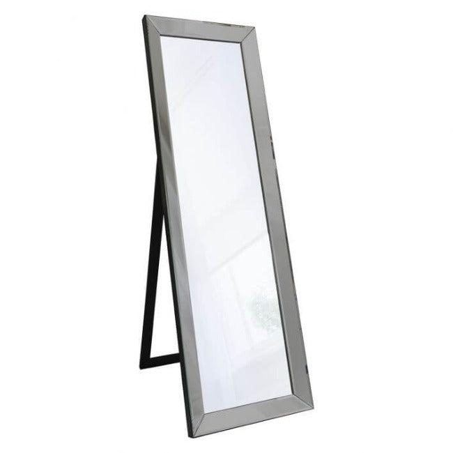 Angled Luna Mirror-Cheval Gray with elegant grey frame and kick stand, perfect for dressing up any room, plants in background.
