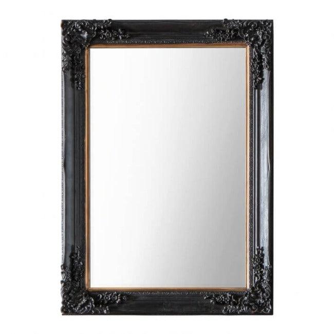 Antique Black Small Harrelson Mirror with Baroque Mouldings on Floral Patterned Wall