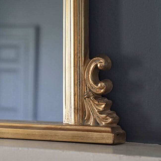 Close-up of gold leaf finish on Dome Overmantle Mirror, showcasing elegant vintage-inspired design and luxurious detail.