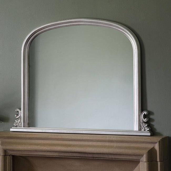 Elegant dome overmantle mirror in silver leaf finish, featuring bevelled glass design, dimensions 94 x 118cm.